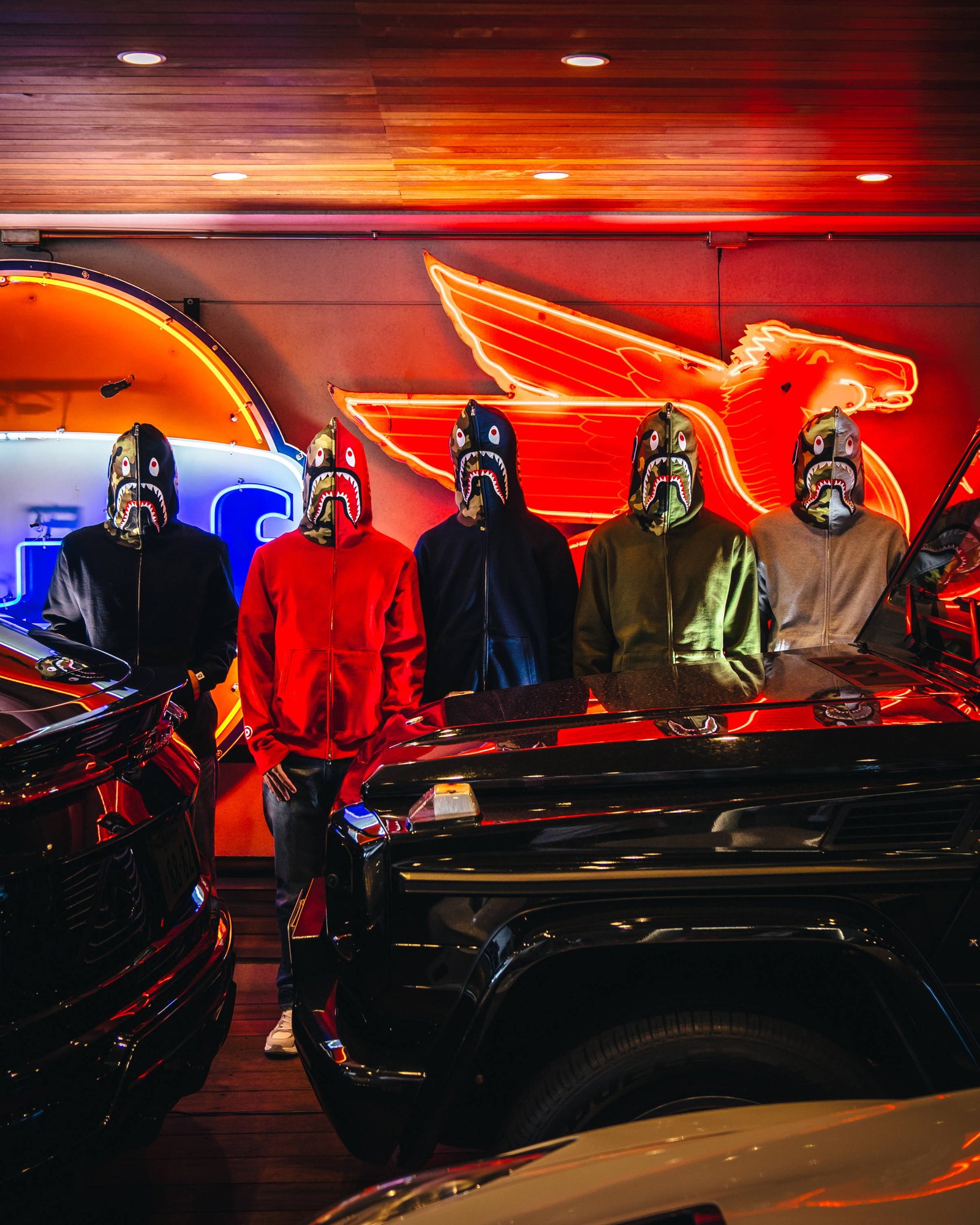 Five models wearing full-zip Shark hoodies in BAPE’s 2024 twentieth-anniversary campaign.