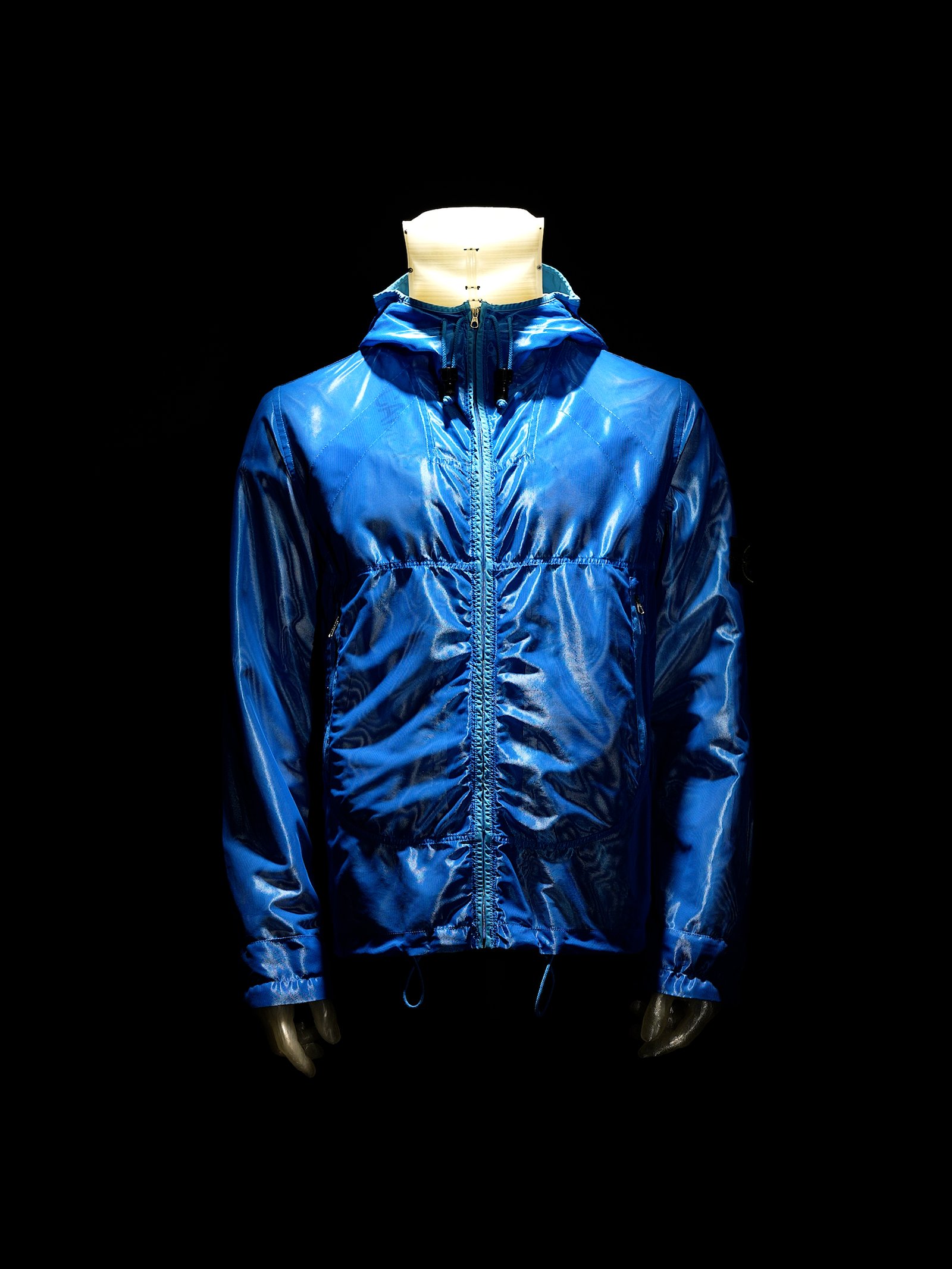 Blue Stone Island Mesh Reflective jacket, article 46154U38, from Spring/Summer 2007.